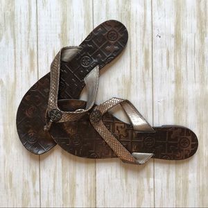 Tory Burch gold and brown flip flops size 9